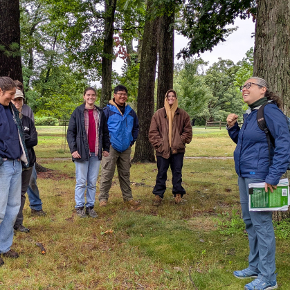 Michele Bakacs leads students on a walk